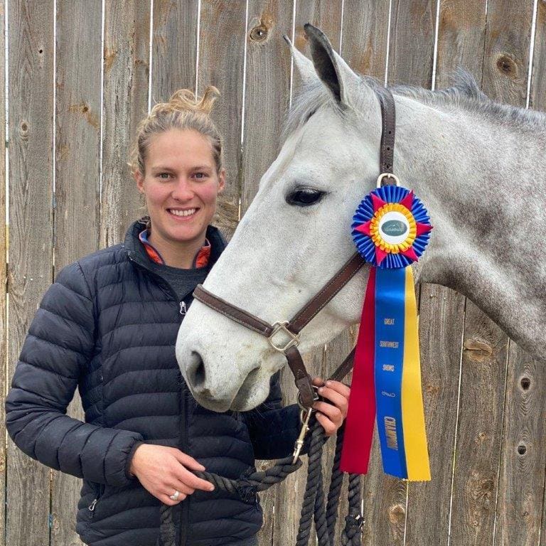 Champion Ribbon Wearing Horse with Owner